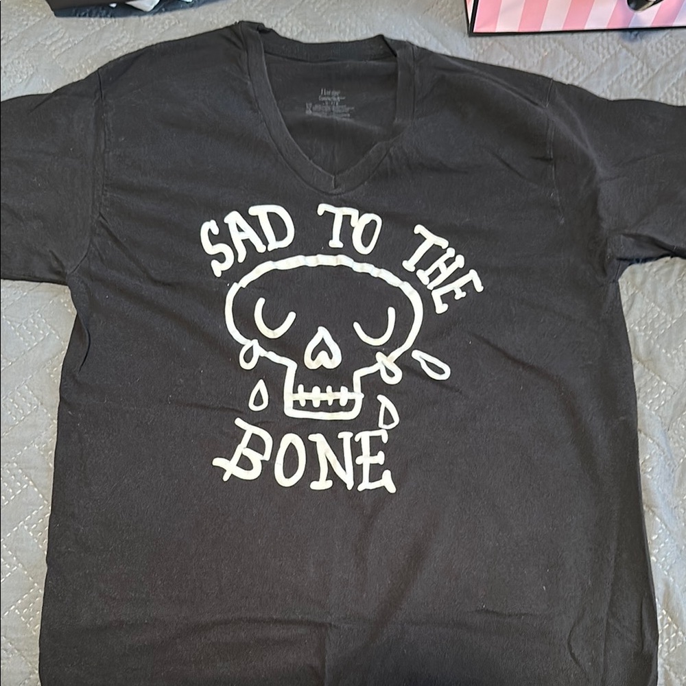 Sad to the Bone. Black Graphic Tee with Skull Design